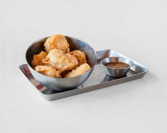 Homemade chicken nuggets with sweet and sour sauce